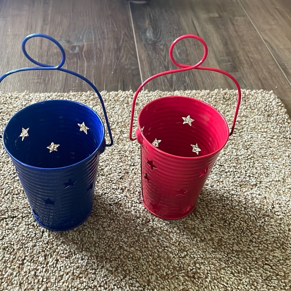 Red and Blue metal candle holders with star cut outs